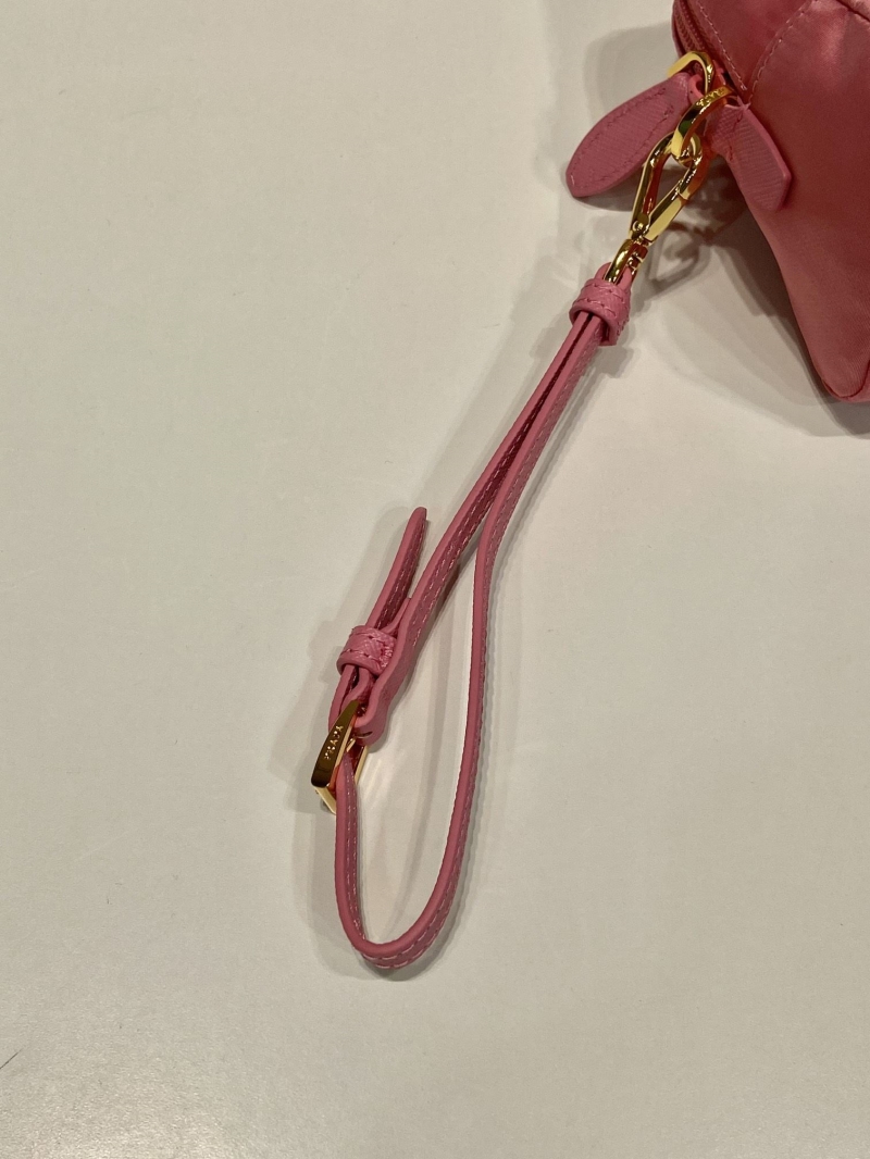 Pra*a clutch bags